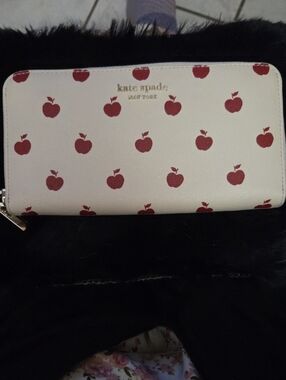 kate spade white wallet with red apple print
